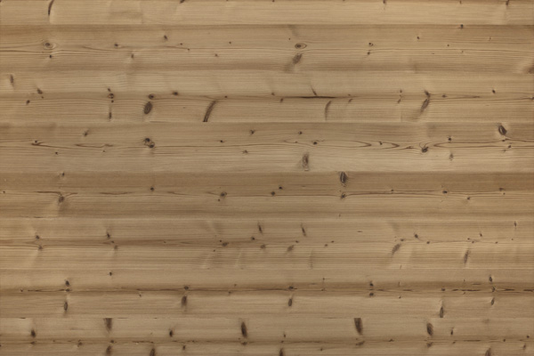 Detailaufnahme einer thermisch behandelten Holzoberfläche aus der Serie „Gran Paradiso 190“, bei 190 °C behandelt und gebürstet. Die warme Farbgebung und betonte Maserung verleihen dem Holz ein charaktervolles und edles Erscheinungsbild.